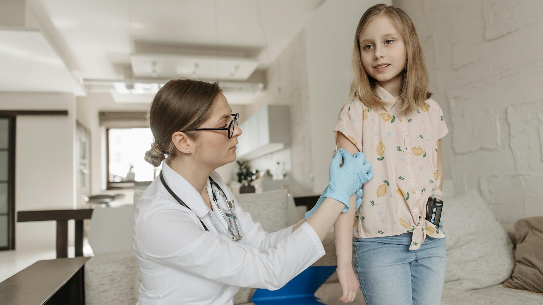 a doctor checking a child